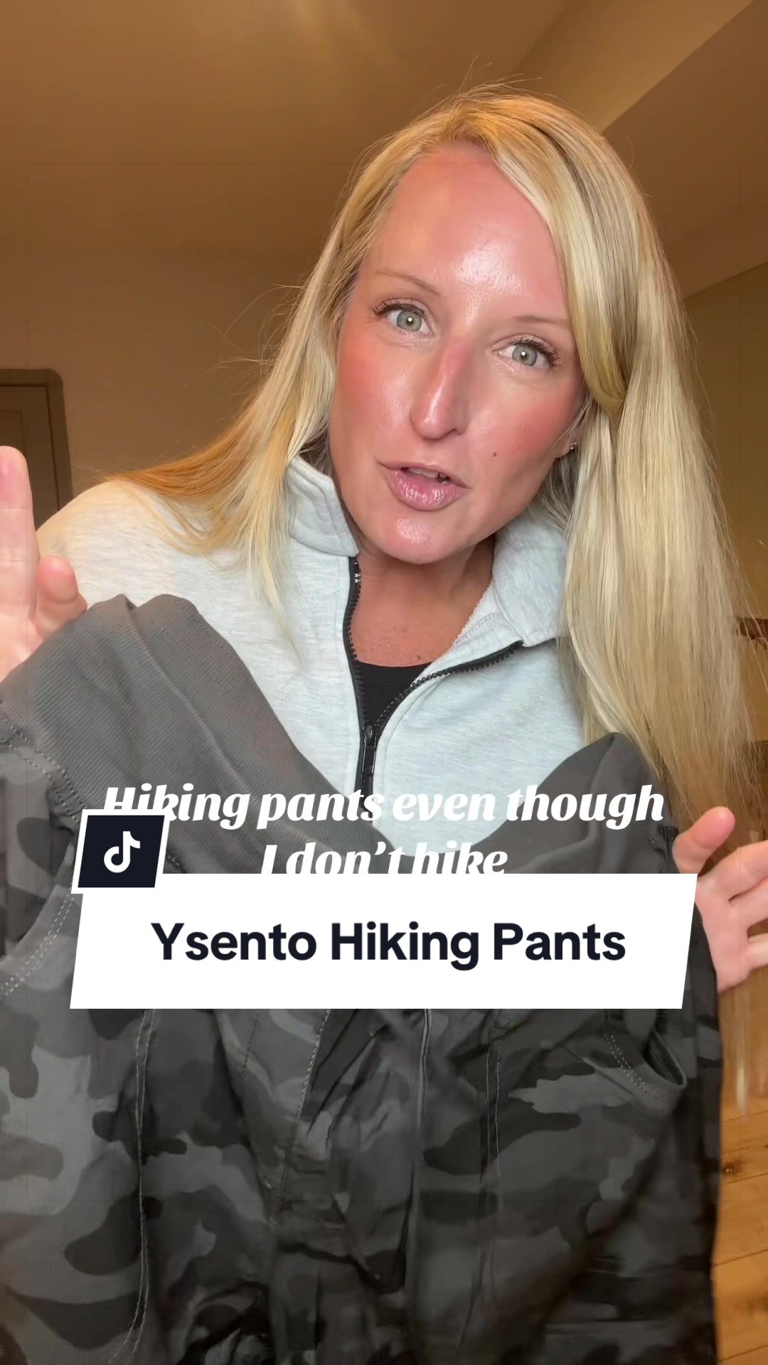 TikTok post by @landpartyof6 for YSENTO. Caption reads: [...] I wear these camo hiking pants from @YSENTO....