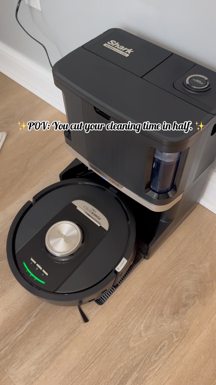 Instagram post by @midwesternmama29 for Shark Home. Caption reads: The @sharkhome PowerDetect NeverTouch Pro stays....