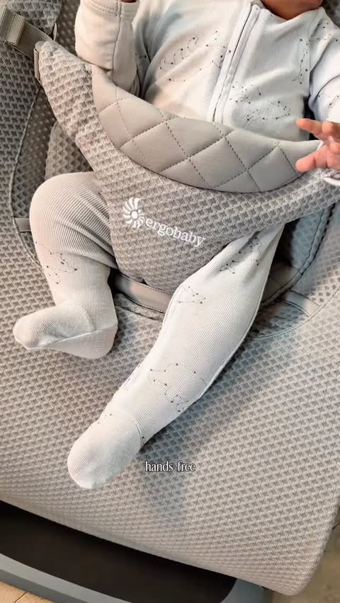 Instagram post by @meghanwilcox for Ergobaby. Caption reads: [...] a bouncer that adapts as he grows. The....
