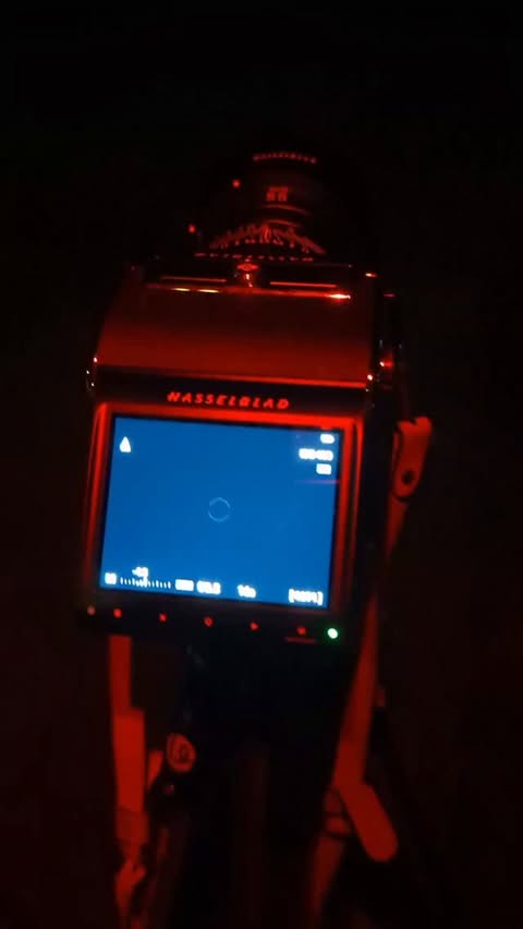 Instagram post by @_snappiness_ for Hasselblad. Caption reads: [...] some faint glimpses of the northern lights....