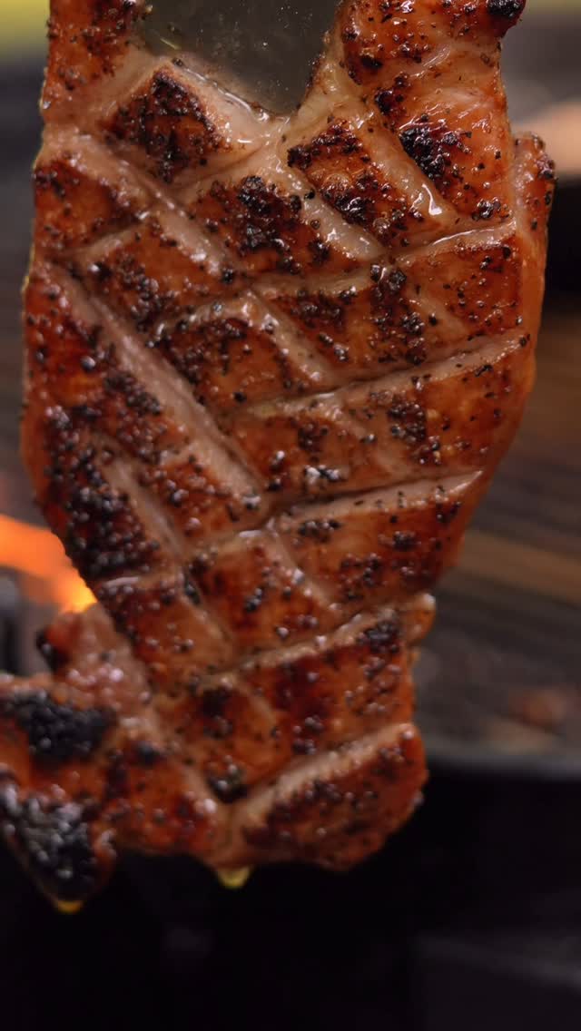 Instagram post by @smokepointq for SNS Grills. Caption reads: Smoked duck breast, honey butter–basted, seared to....