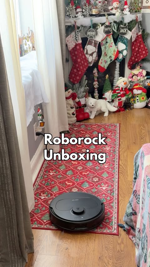 Instagram post by @livingplanetfriendly for Roborock. Caption reads: Unboxing the perfect Christmas gift for adults....