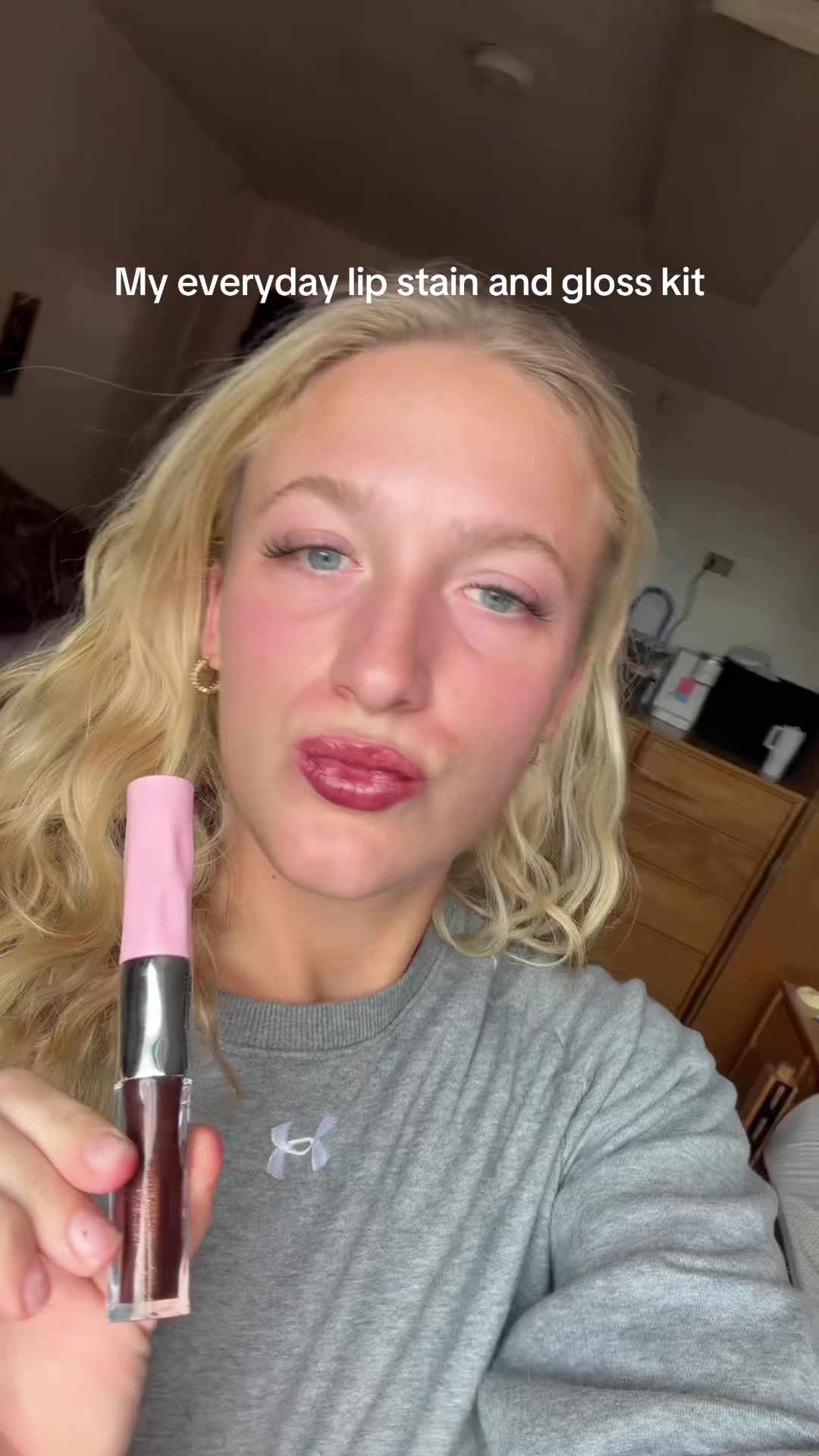 TikTok post by @addie_adkinssss for Okay Love Lashes. Caption reads: @OKAYLOVE the perfect everyday lip stain peel and....