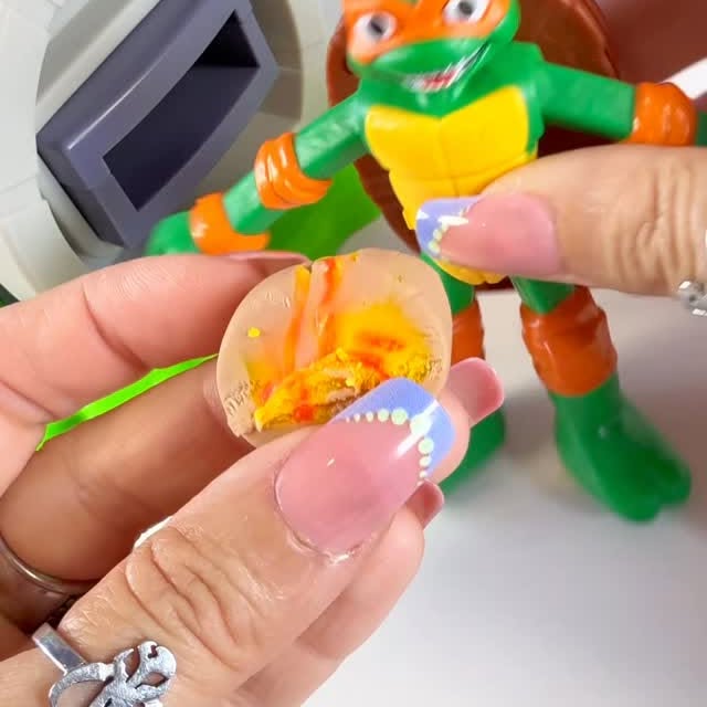 Instagram post by @dreamteamsworld for Play-Doh. Caption reads: TMNT Play-Doh Slice & Blast Pizza Playset #tmnt....