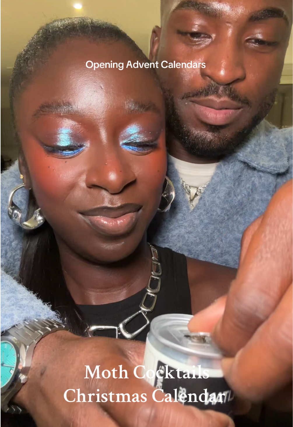 TikTok post by @versarxhie for MOTH Drinks. Caption reads: tipsy countdown to christmas 🍸 w my babes....