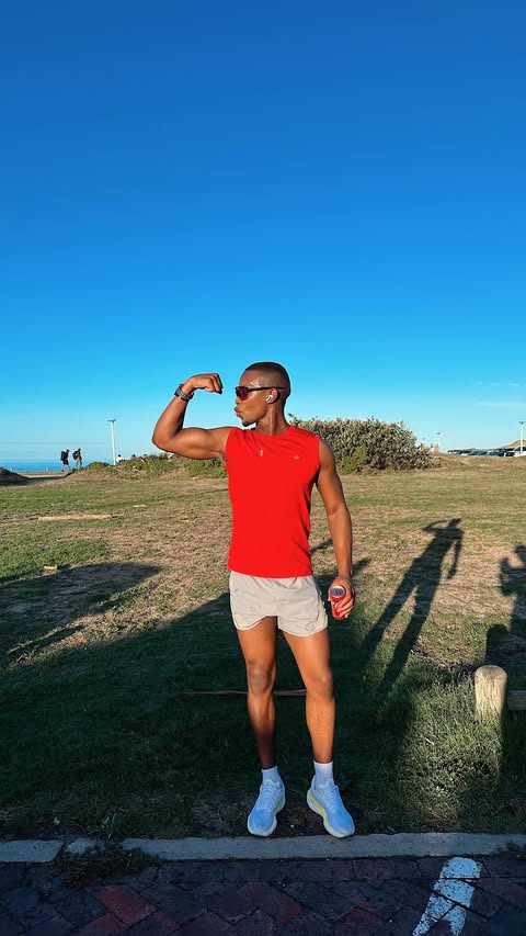 Instagram post by @athinimagodla for Absa Group. Caption reads: #Ad This year we do it again. Absa Run Your City....