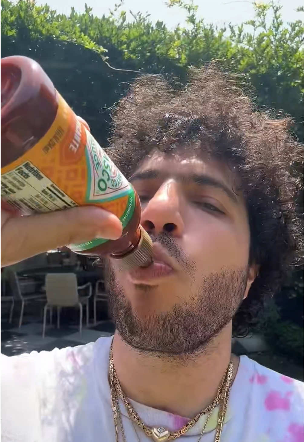 TikTok post by @itsbennyblanco for TABASCO. Caption reads: One bite nacho with new @TABASCO BRAND Salsa....
