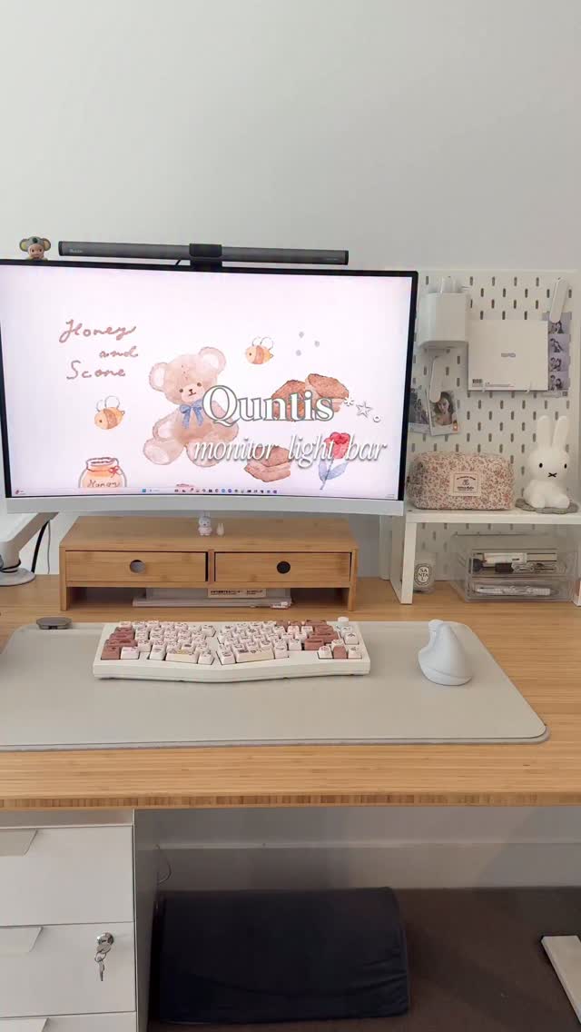 Instagram post by @rinfolk for Quntis. Caption reads: the perfect monitor light bar from....