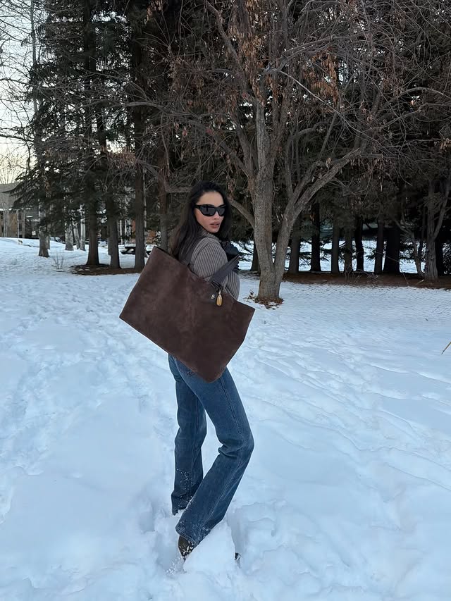 Instagram post by @kelseymerritt for Alo Yoga. Caption reads: whiteout @alo #alopartner.