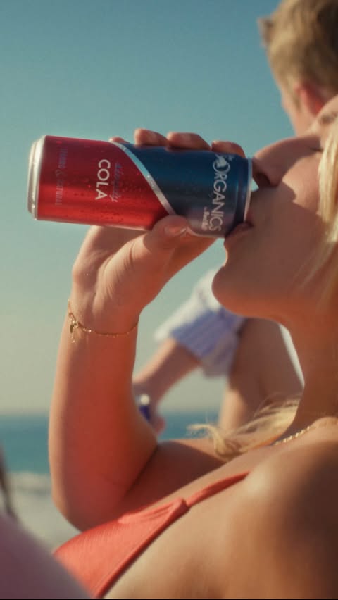 Instagram post by @organicsbyredbull for Red Bull. Caption reads: [...] living in the moment! 🌊☀️....