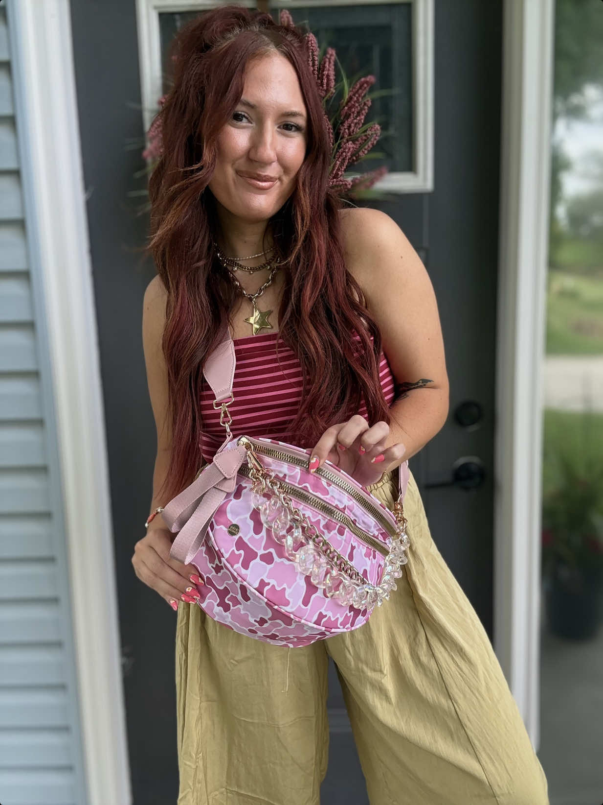 TikTok post by an influencer for Gold Blush. Caption reads: Run 👀💖 @Gold Blush #bumbag #pinkcamo [...].
