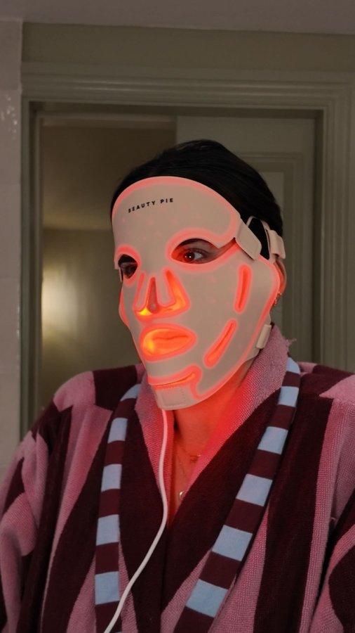 Instagram post by @lilypebbles for BEAUTY PIE. Caption reads: Rich keeps stealing my LED mask… so I made him do....