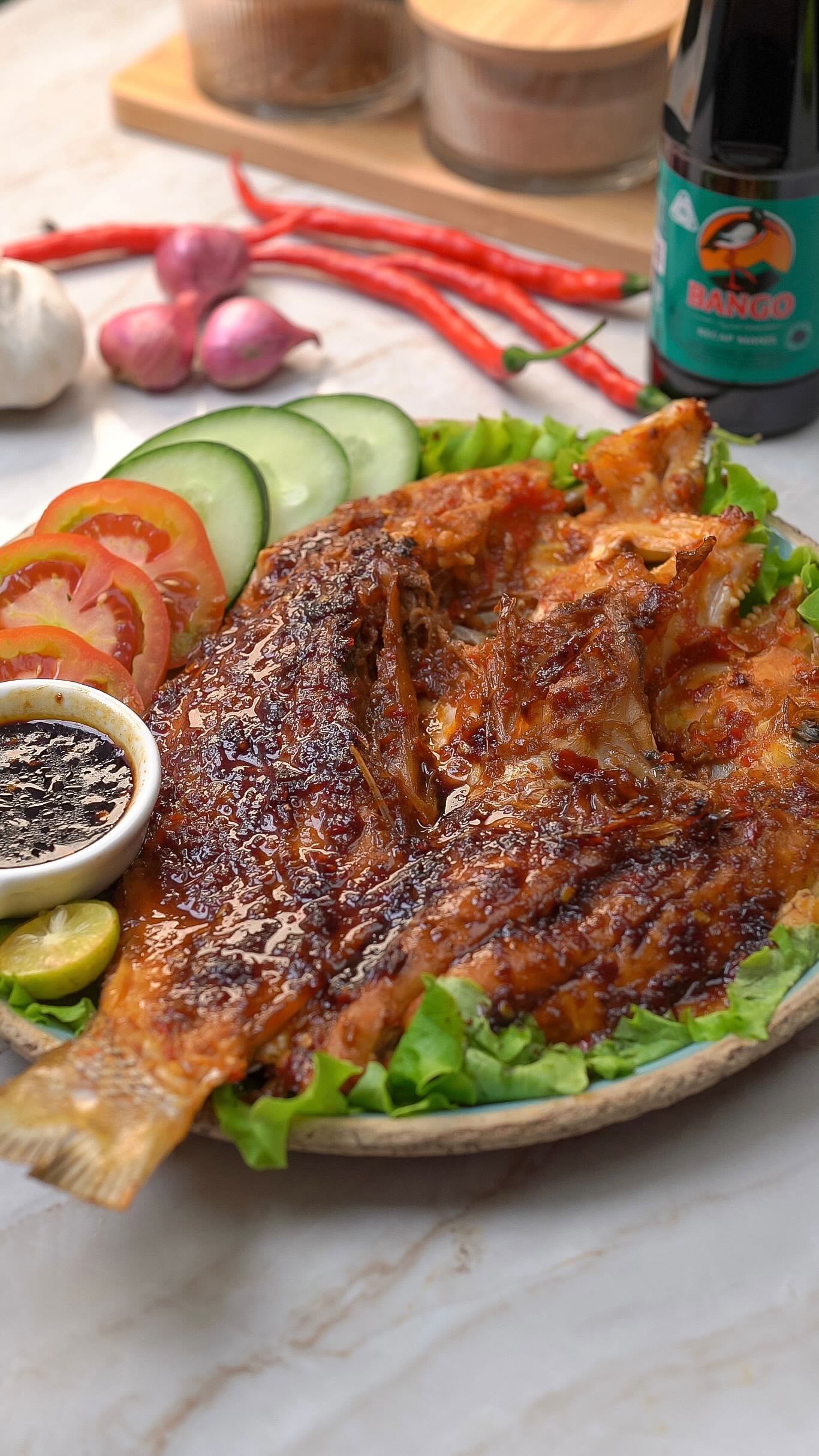 Instagram post by @lis.achmady for Alfamart. Caption reads: Bukan ikan bakar biasa…
Ini Parape khas Makassar....