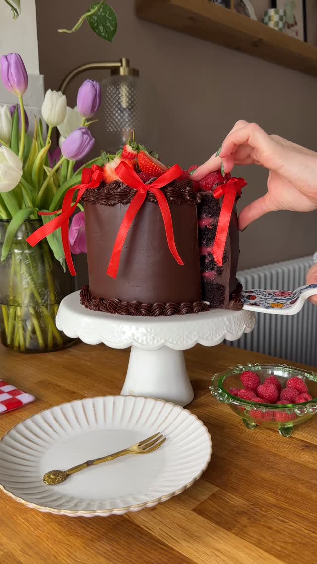 Instagram post by @bakesby.olivia for Lindt. Caption reads: Chocolate & Raspberry heaven 💕 A gooey chocolate....