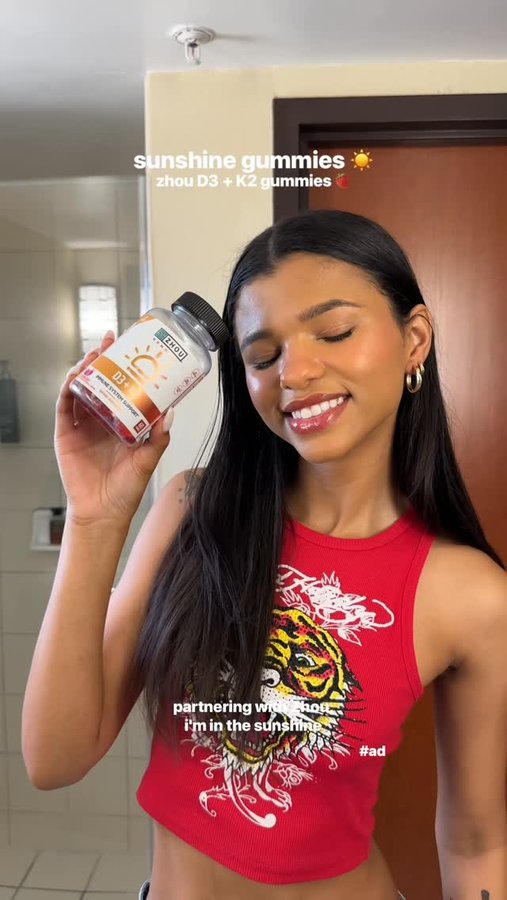 Instagram post by @exoticblendd for Zhou Nutrition. Caption reads: #ad sunshine state w/ sunshine vitamins ☀️🍓....