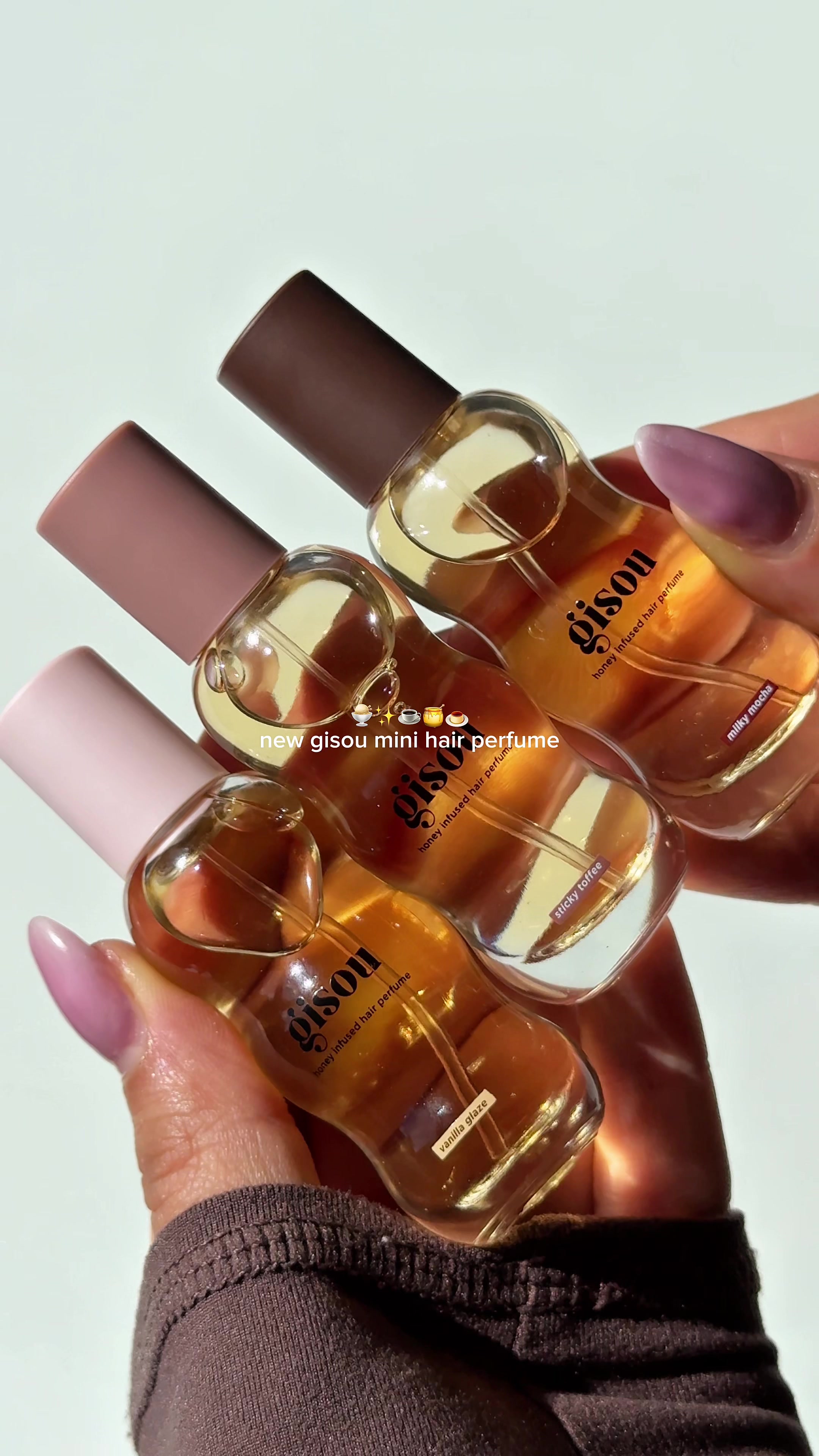 TikTok post by @seda.eks for Gisou. Caption reads: [...] mini parfums pour cheveux @Gisou , ça sent....