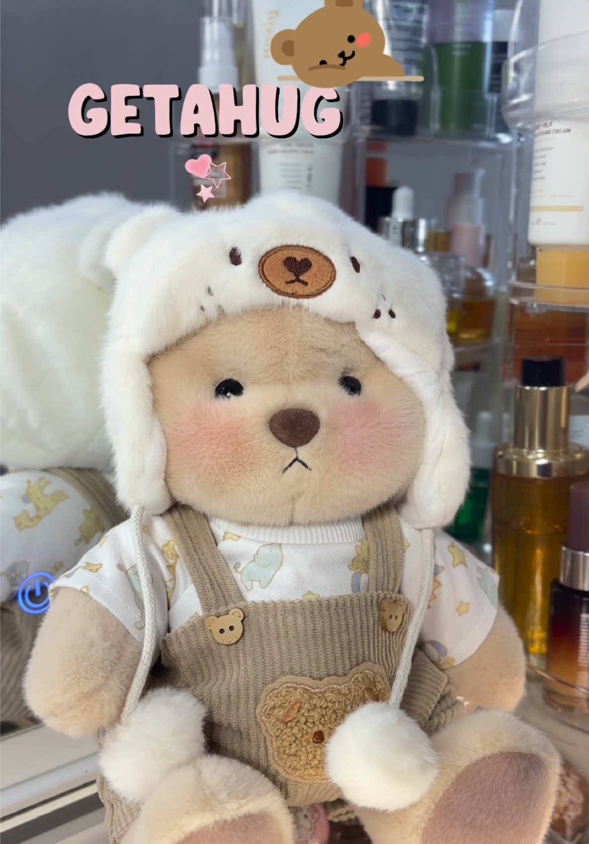 TikTok post by @stephanie.centeno_ for Getahug. Caption reads: [...] his tiny outfit and hat… I’m obsessed✨....