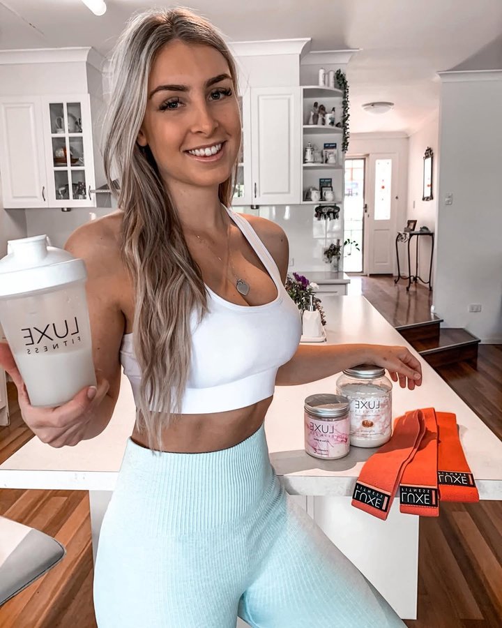 Instagram post by @emma.gracce_ for LUXE Fitness. Caption reads: Morning snack using my salted caramel @luxefitness....