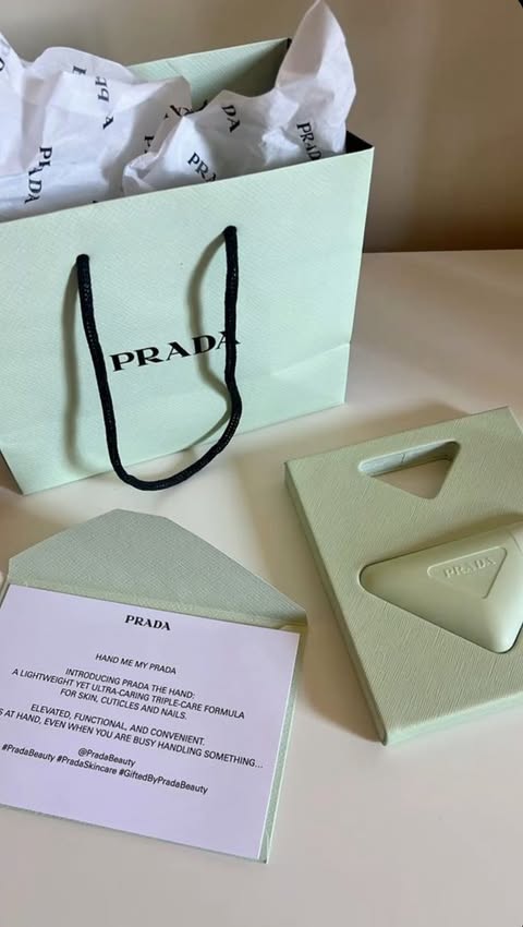 Instagram post by @tamshankulashvili for Prada. Caption reads: ✨ Prada — the luxury your hands deserve, turning....