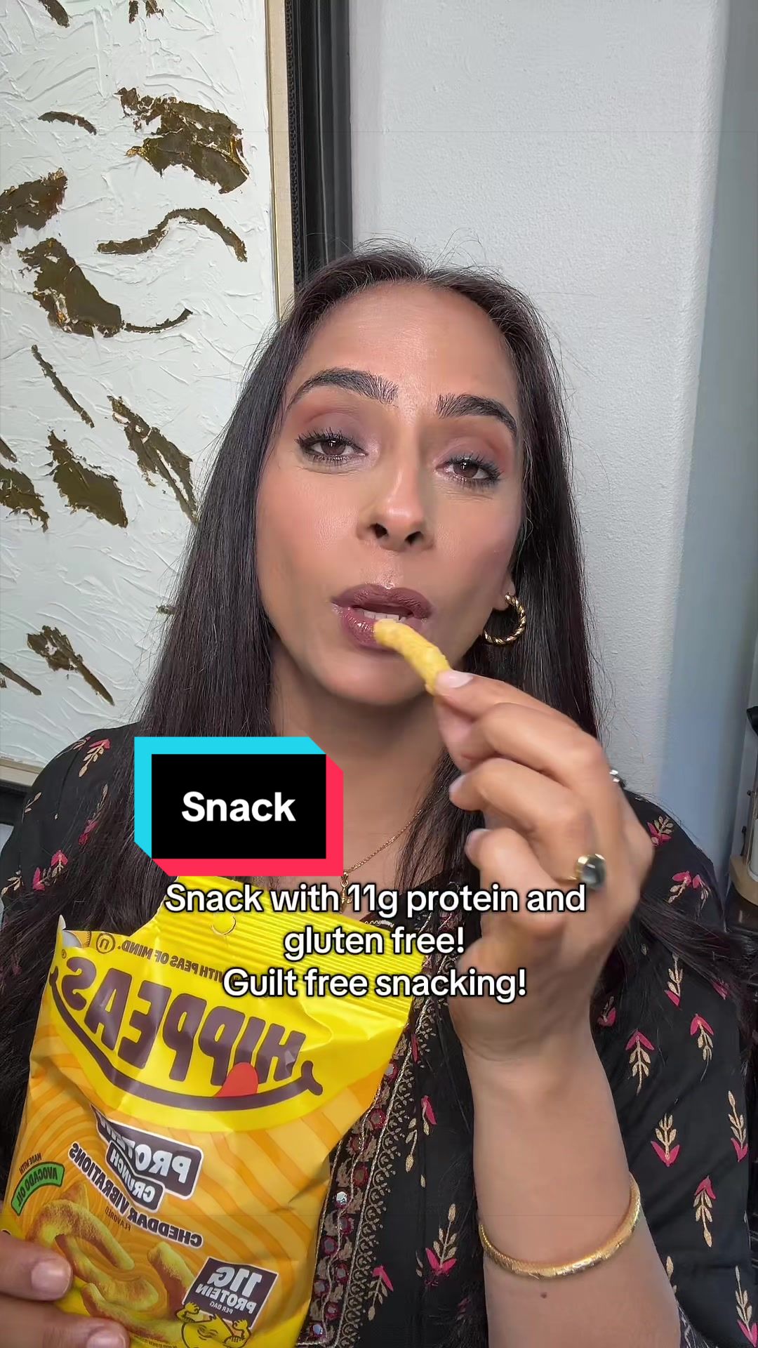 TikTok post by @geeta.sougu for HIPPEAS. Caption reads: [...] #guiltfreesnacks @HIPPEAS Snacks.