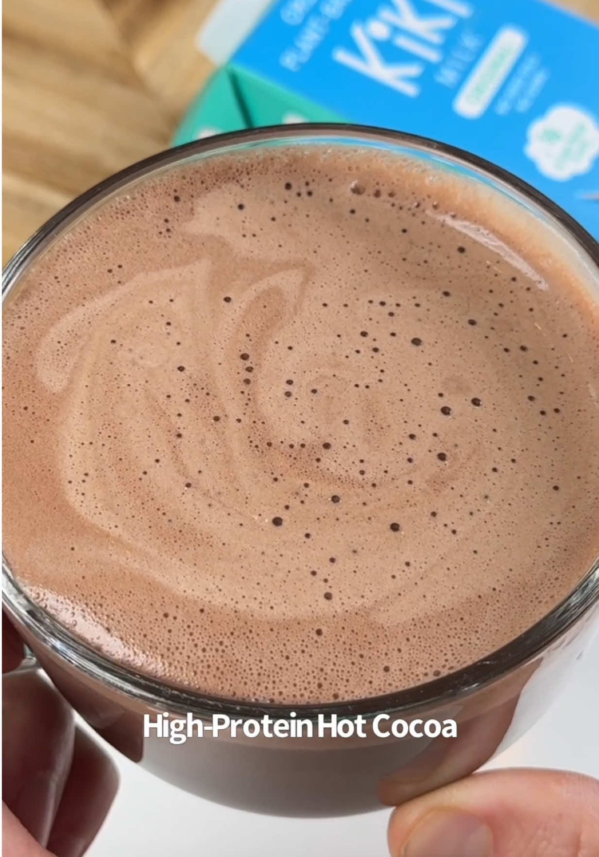 TikTok post by @iricksnacks for Kiki Milk. Caption reads: Healthy High Protein Hot Chocolate Recipe to....