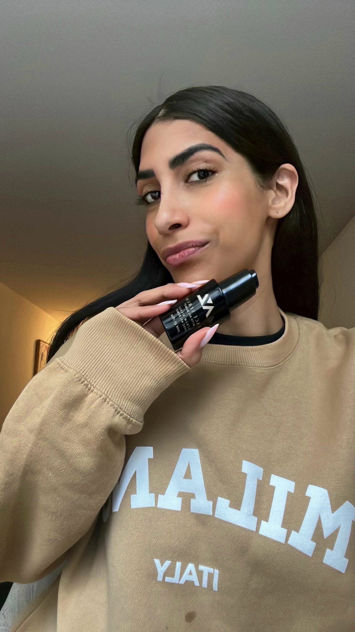 Instagram post by @thatdesiglow for AV Laboratories. Caption reads: NYC life doesn’t stop—and neither does my....