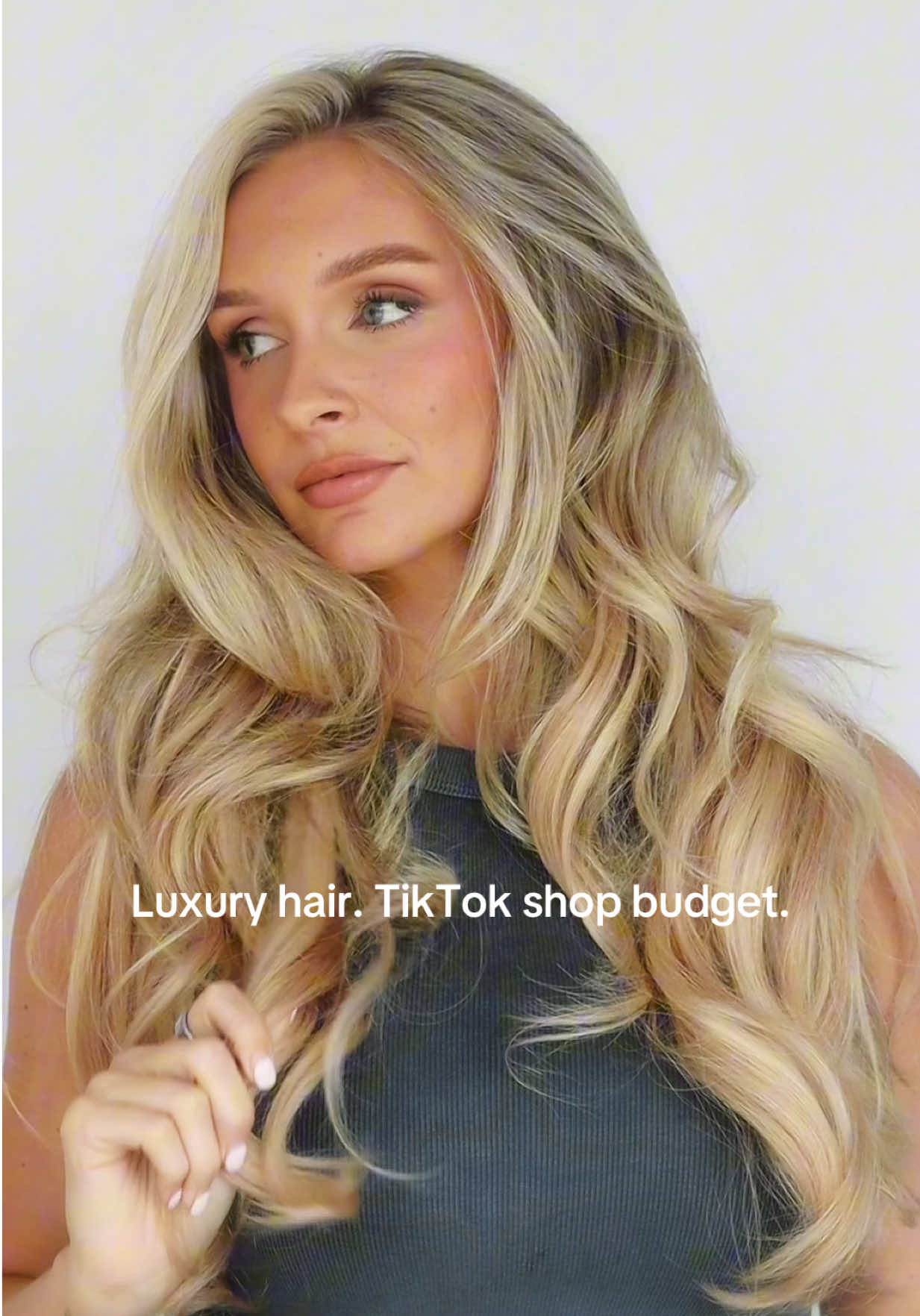TikTok post by @mckenziecoggins for Googoo Hair. Caption reads: [...] # 16/22 color/length #hairextensions....