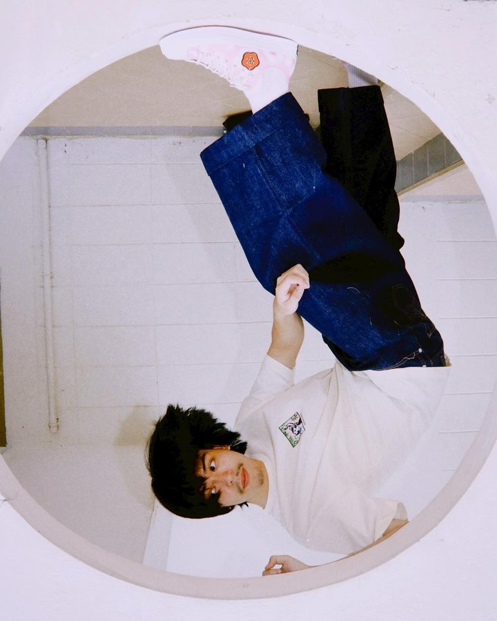 Instagram post by @vixmmnnt for KENZO. Caption reads: #ConversexKenzo #KENZONIGO #KENZOTH.