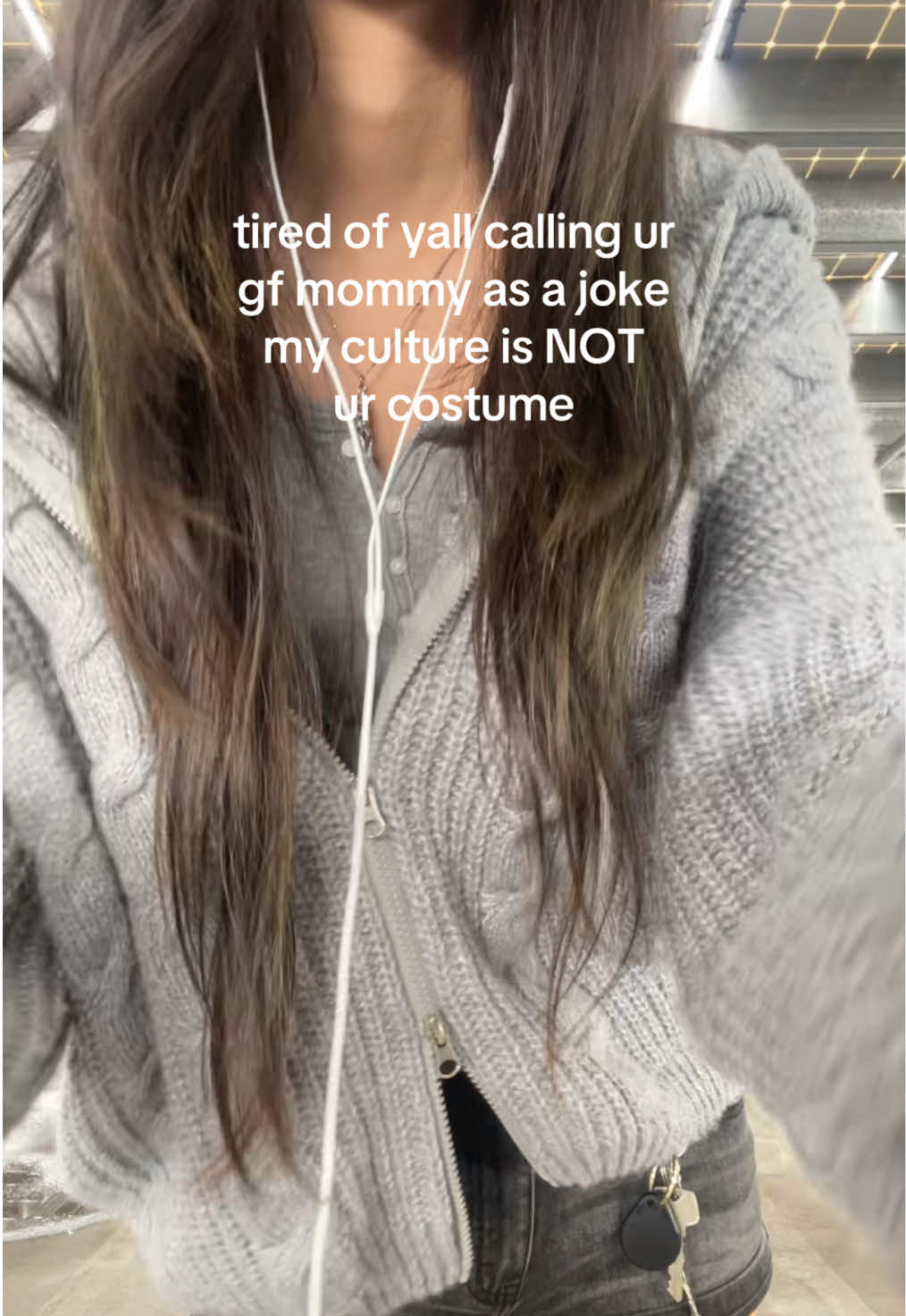 TikTok post by @ruerookie for LEWKIN. Caption reads: jacket and socks from @Lewkin use my discount code....