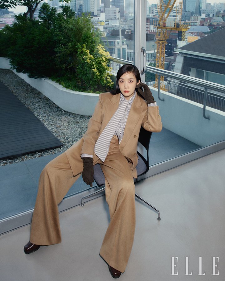 Instagram post by @leechungah for Max Mara. Caption reads: MaxMara Icon coat x Camel styling 

 #AD @maxmara....