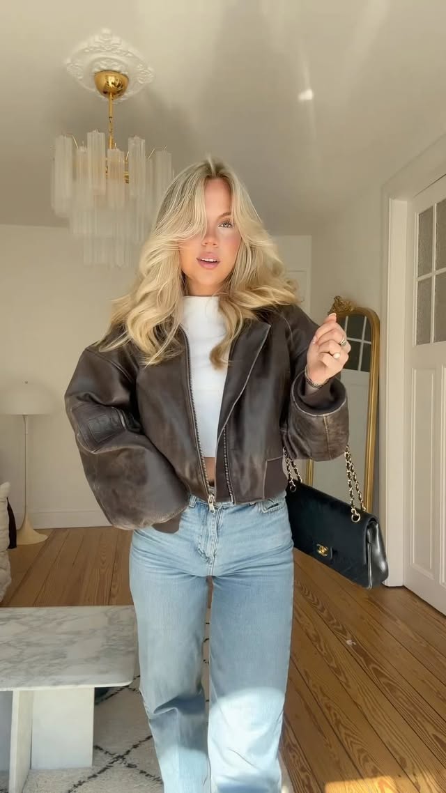 Instagram post by @ameliekaufeisen for Meotine. Caption reads: dream jacket!!🥹🤎🧸 @meotine 𝑎𝑛𝑧𝑒𝑖𝑔𝑒.