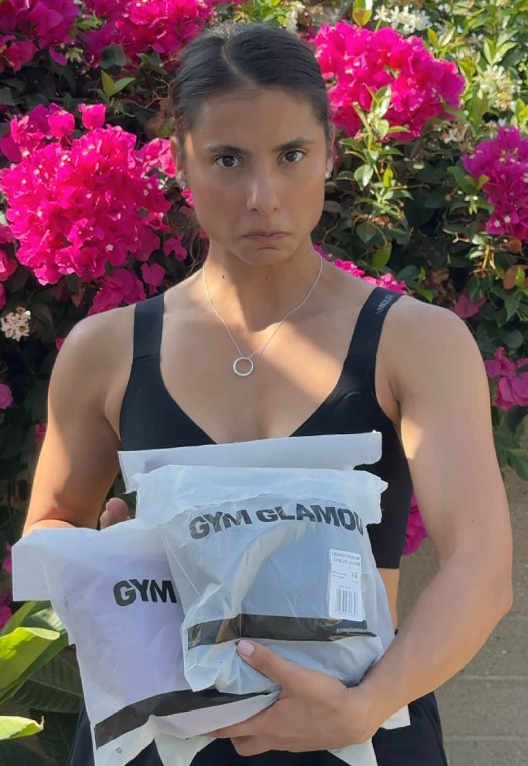 TikTok post by @miha.fitchick for Gym Glamour. Caption reads: Voua care dintre aceste tinute de la GYM GLAMOUR....