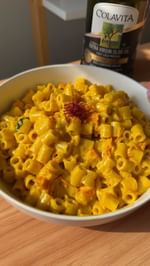 Instagram post by an influencer for Colavita. Caption reads: [...] National EVOO Day with @colavitausa and this....