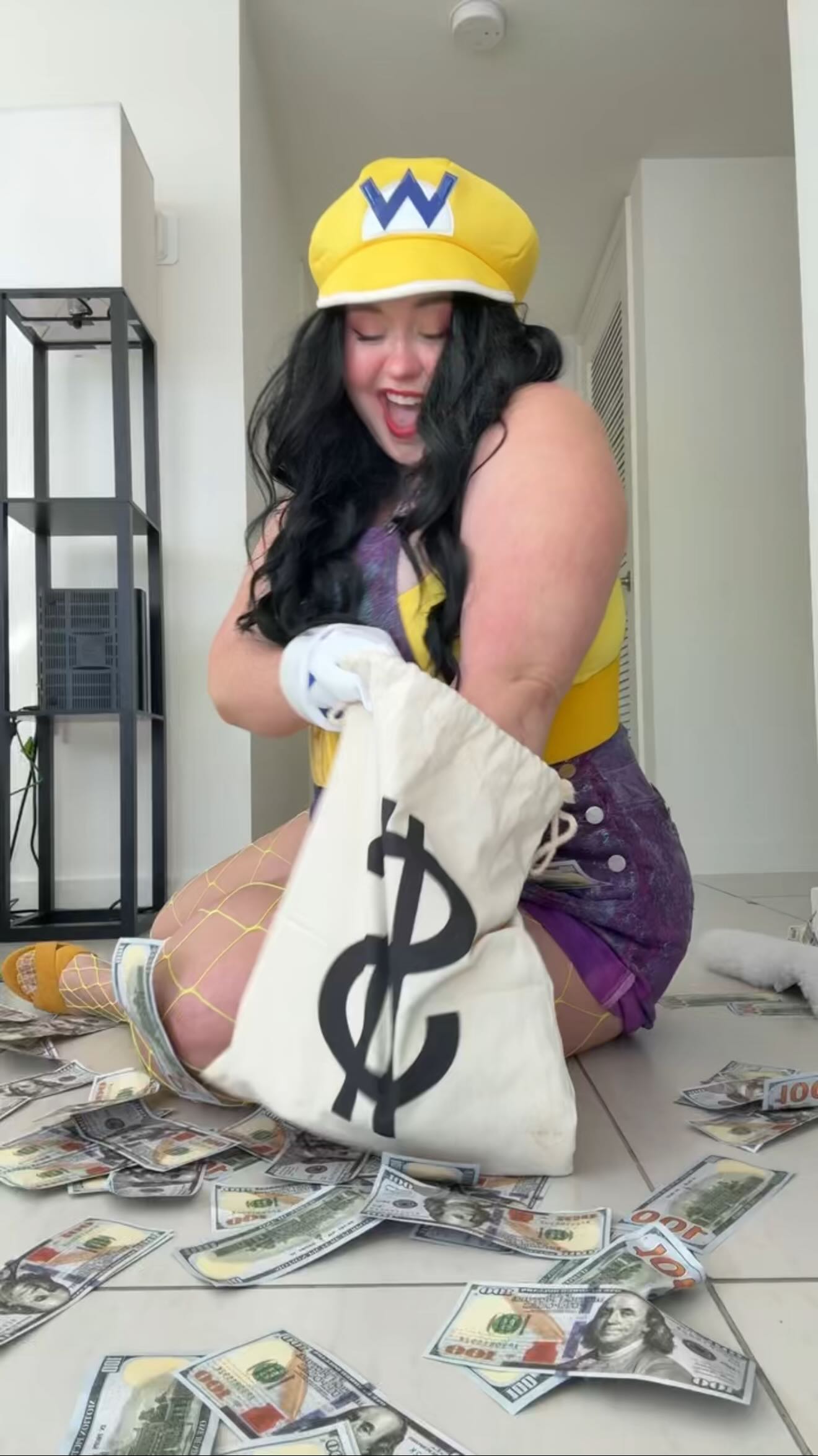 Instagram post by @presidentniki for Nintendo. Caption reads: There’s something about a big bag of cash that....