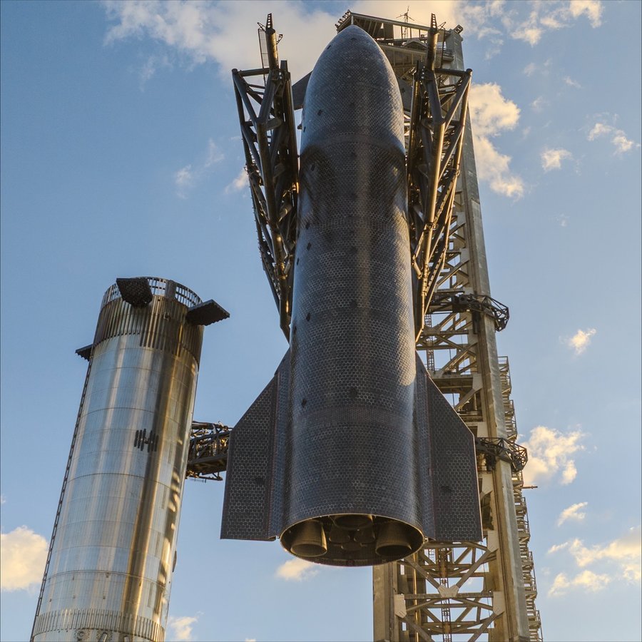 Instagram post by @spacex_spacenews for SpaceX. Caption reads: Starship stacked for flight. This is planned to be....