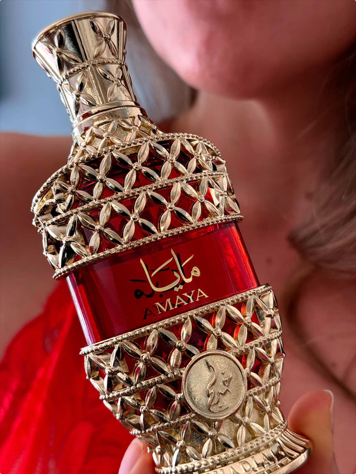 TikTok post by @americanbeauty202 for Khadlaj Perfumes. Caption reads: Maya perfume oil by @Khadlaj Perfumes is the kind....