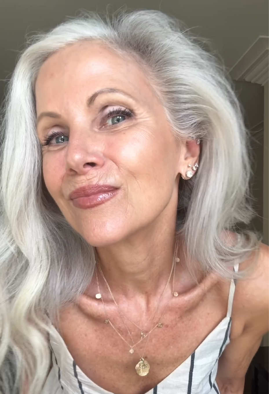 TikTok post by @whitehairwisdom for Elm Biosciences. Caption reads: [...] skin. ✨ I’ve been incorporating @Elm....