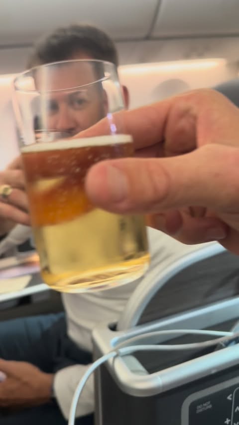 Instagram post by @drew_mitchell for Qantas. Caption reads: Cheers to our next trip! 🇫🇷

Easy work with....