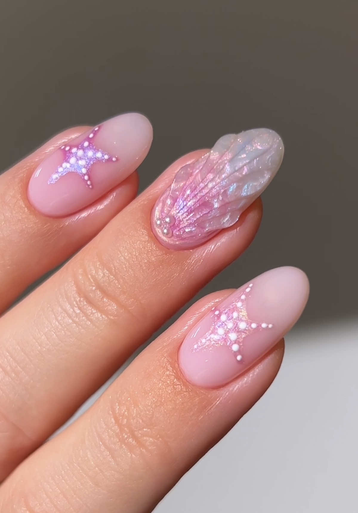 TikTok post by @heygreatnails for Makartt. Caption reads: [...] she’s everything !! 🐚✨ •ad using....