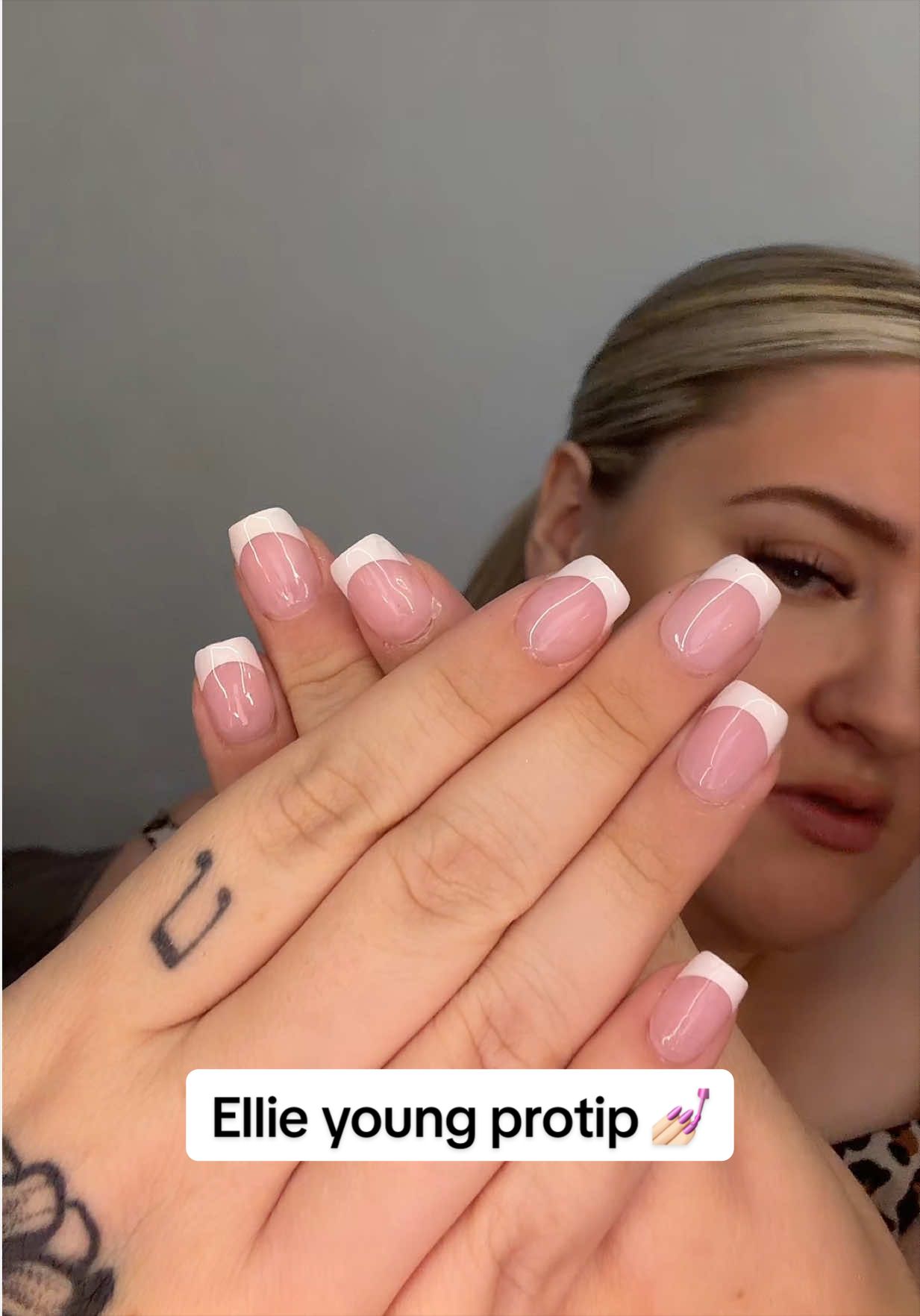 TikTok post by @abbiratcliffe for Ellie Young Beauty Shop. Caption reads: @Ellie Young Nails Ltd GIRLLLLL SLAYYY 💅....