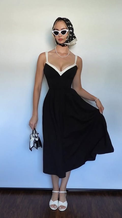 Instagram post by @dora.lulic for TA3. Caption reads: Styling the @ta3 Fit & Flare Midi Dress into a....