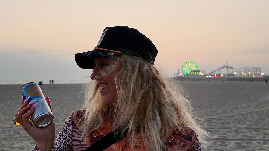 Instagram post by @alyslaymusic for Goorin Bros.. Caption reads: HIGH SUNSETS at Santa Monica with my new fave....