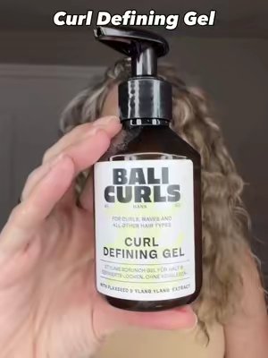 TikTok post by @curlykiet for Bali Curls. Caption reads: Curly Space Buns 🫶🏼 Products used @Bali Curls....
