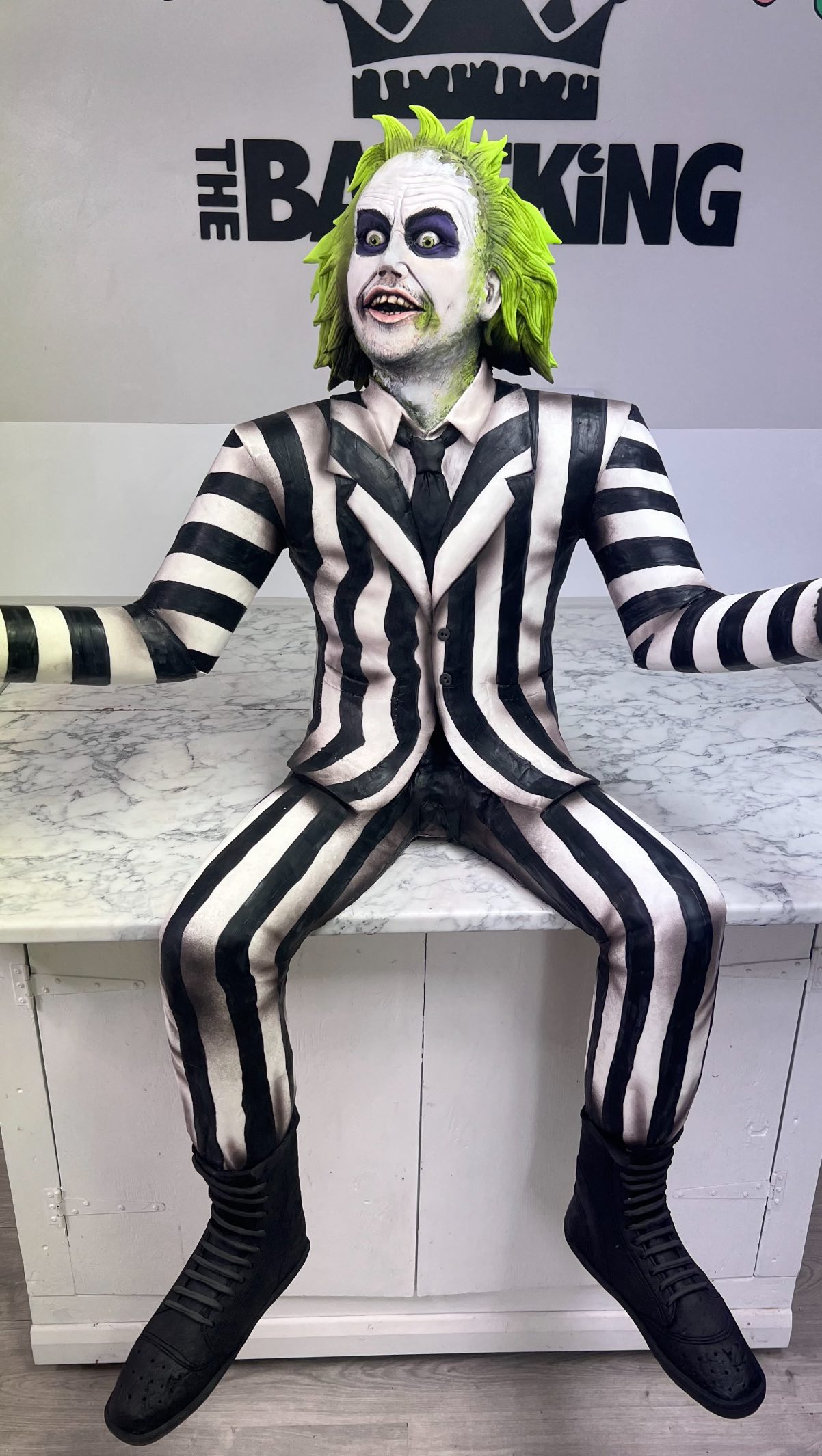 Instagram post by @the_bakeking for Beetlejuice. Caption reads: “It’s Showtime” 🍰 
…The ‘ber’ months are here....