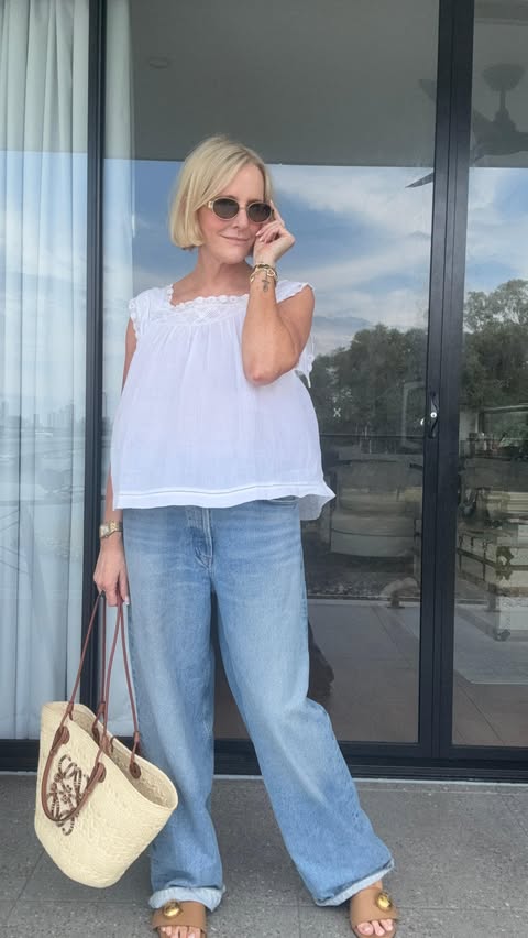 Instagram post by @howtwostyle_midlife for NET-A-PORTER. Caption reads: [...] always discovering new brands through....