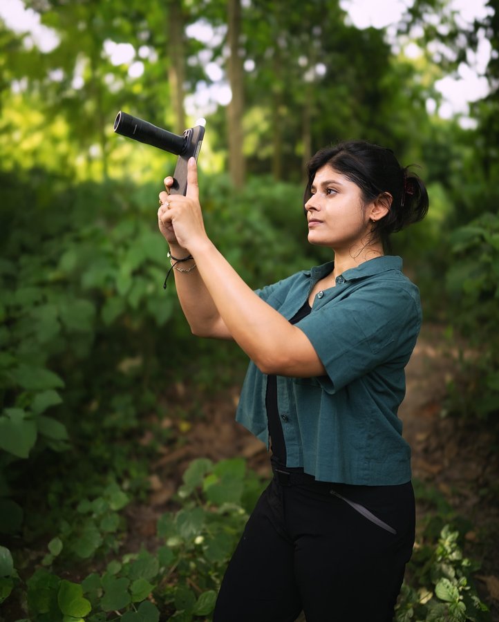 Instagram post by @aparupa.dey for SANDMARC. Caption reads: Who knew a phone could take me this far....