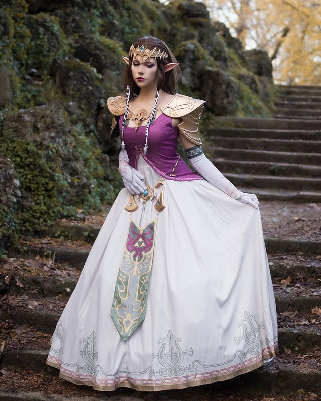 Instagram post by @curly.natsu for CosFun. Caption reads: [...] •Costume, armor and tiara by....