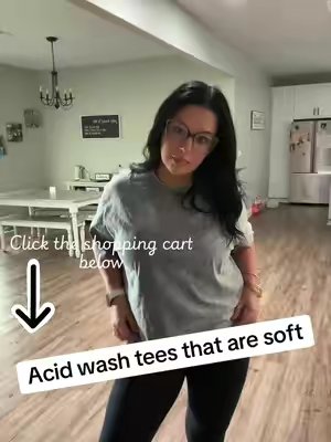TikTok post by @veramarie1002 for The Mad Hatter Company. Caption reads: [...] #acidwashtshirts #shirts @The Mad Hatter....