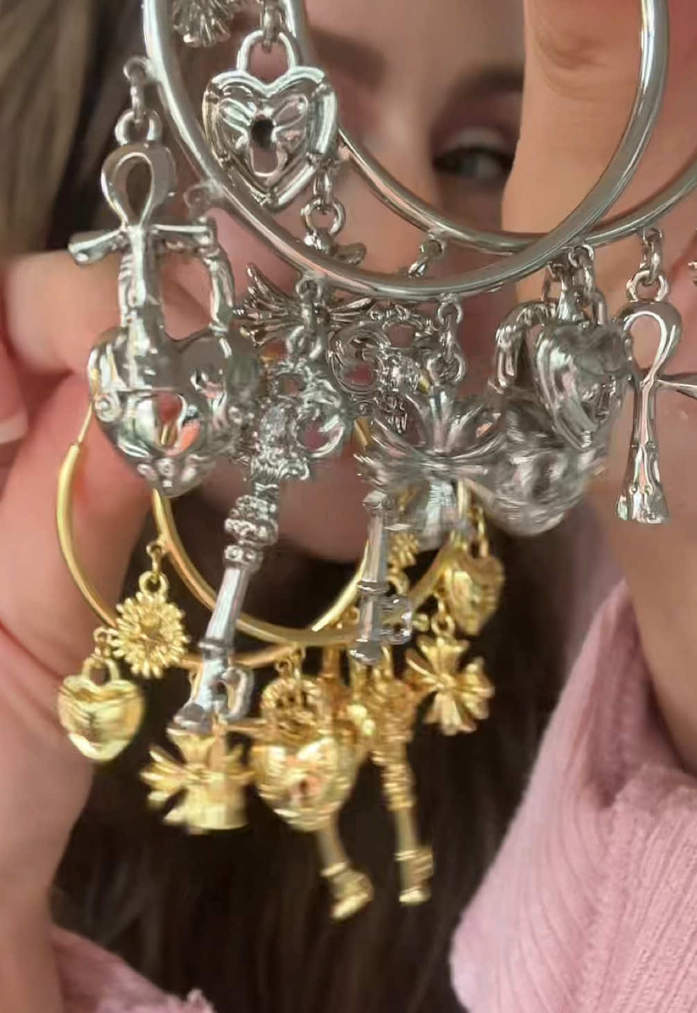 TikTok post by @rosymaplesloth for GANIA. Caption reads: Hands down, my new favorite earrings! @GANIA....