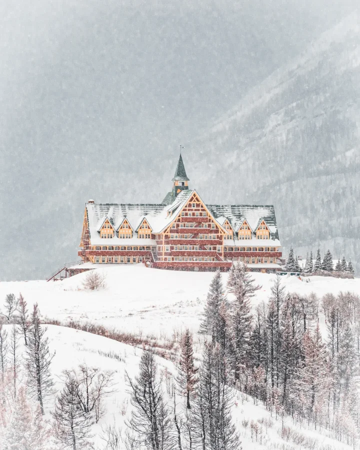 Instagram post by @sameer.pictures for Travel Alberta. Caption reads: Waterton in winter transforms into a serene and....